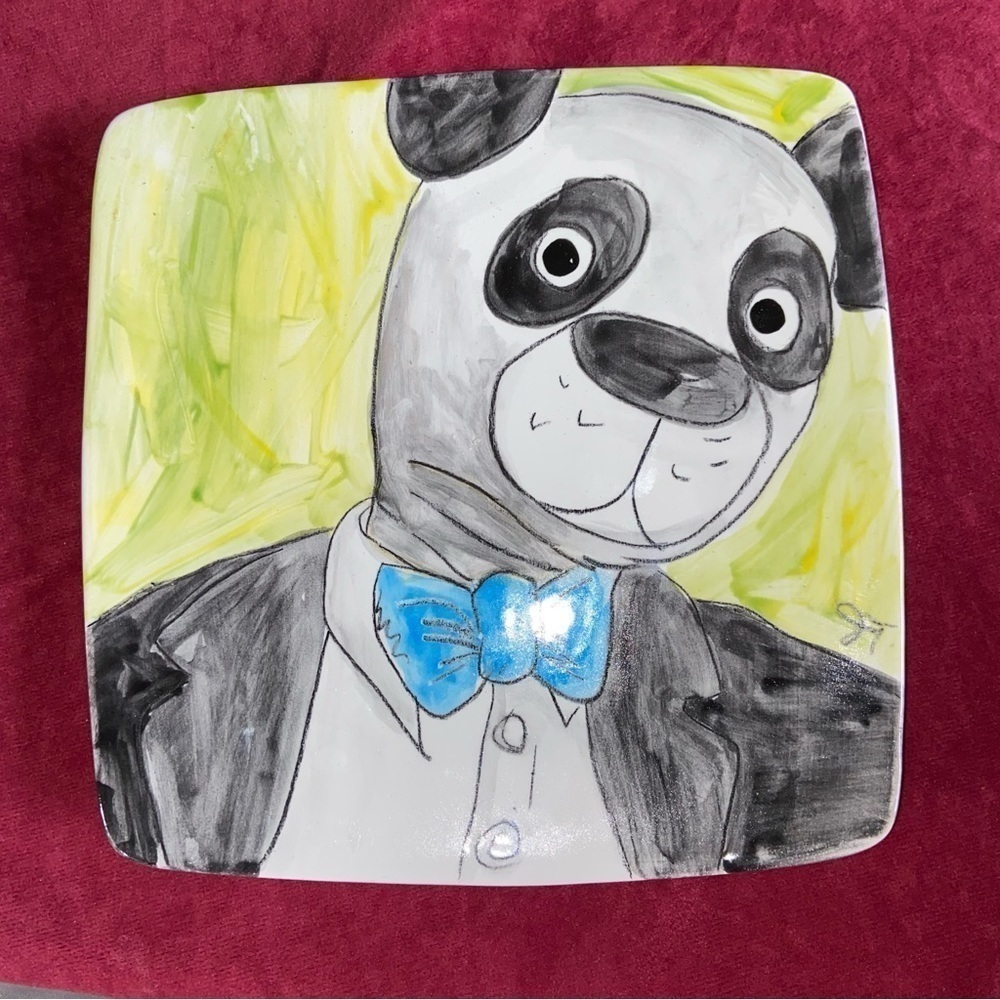 Justin Torres hand painted 9” plate. But is he a dapper dog or panda w/ panache?